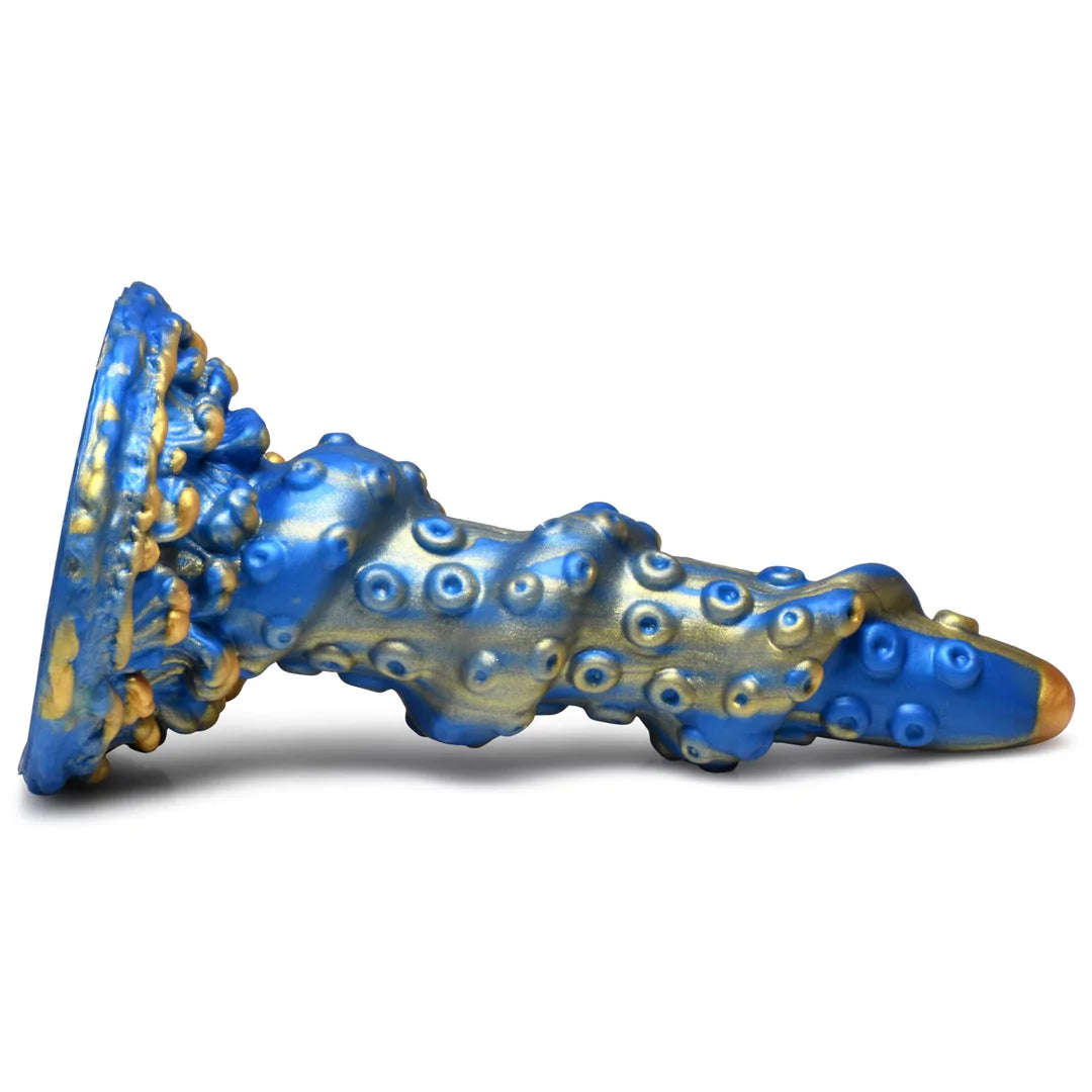 Kraken Blå Fantasy Dildo: Blå og gullfarget silikondildo med tentakelform, sugekopper og bølgende tekstur.