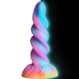 Moon Rider fantasy dildo med glødende enhjørningshorn, spiralformet skaft i rosa, blått, lilla og gult.