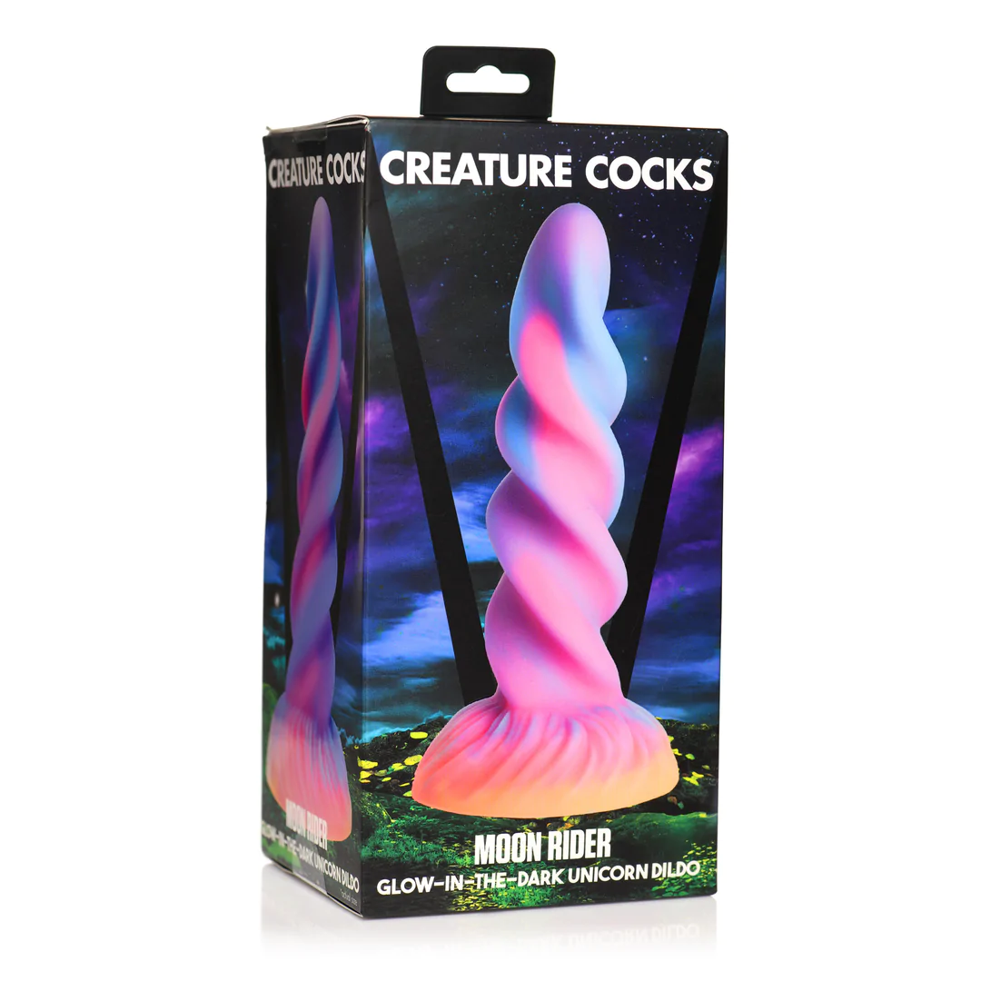 Moon Rider fantasy dildo i eske, med glødende enhjørningshorn, spiralformet skaft og fargesprakende design.