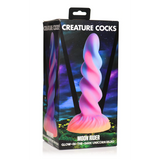 Moon Rider fantasy dildo i eske, med glødende enhjørningshorn, spiralformet skaft og fargesprakende design.
