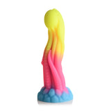 Fargerik, glødende silikon tentakeldildo med eggformet topp og sugekopper, i blått, rosa og gult.