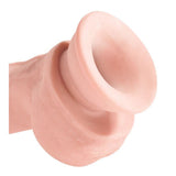 Naturtro King Cock Plus Triple Density dildo i hudfarge med sugekoppbase.