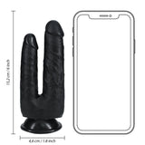 Sort RealRock dobbel dildo med 12,7 og 15,2 cm realistiske sjakter, sugekoppbase, vist ved siden av en telefon for størrelse.