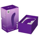 We-Vibe Melt 2 lilla lufttrykksvibrator i myk silikon, vist i åpen og lukket emballasje.