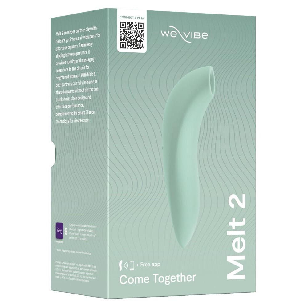 We-Vibe Melt 2 lufttrykksvibrator i dus grønn silikon, vist i sin elegante produktemballasje.