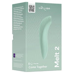 We-Vibe Melt 2 lufttrykksvibrator i dus grønn silikon, vist i sin elegante produktemballasje.